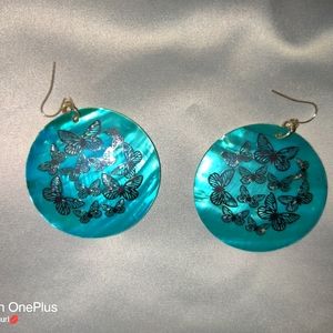 Earrings of seashell with sterling decal